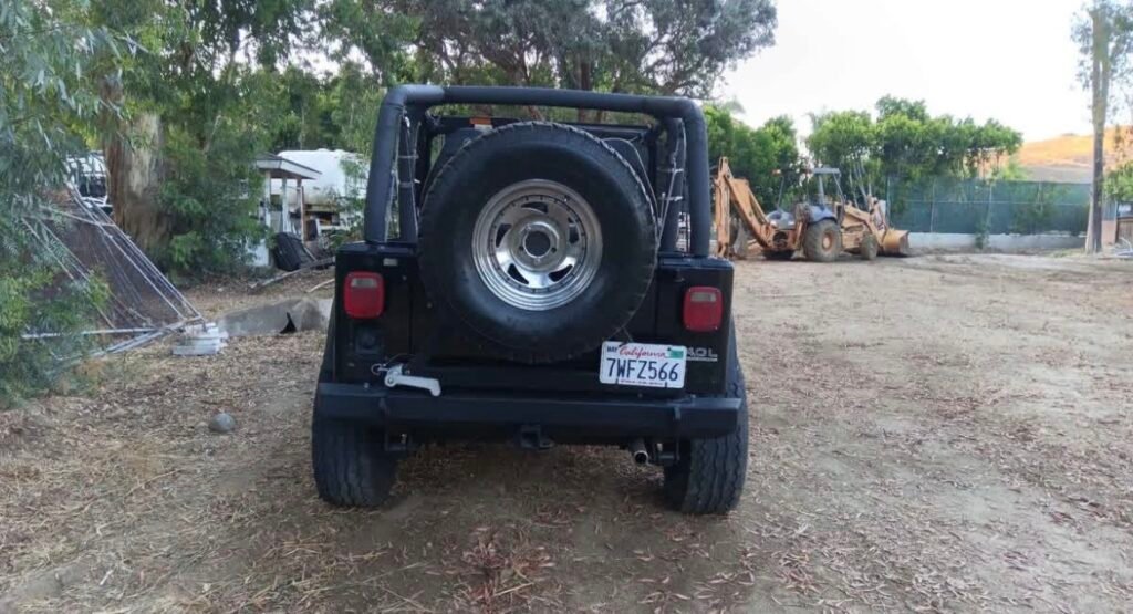 Rear view of Jeep Wrangler YJ with spare tire and rear bumper – 1987-1995