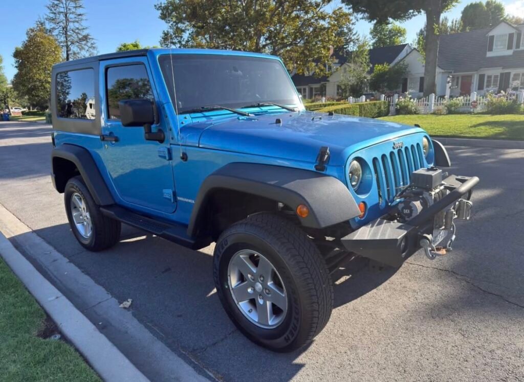 Blue Jeep Wrangler JK 2-door hardtop with winch bumper – used OEM parts 2007-2018